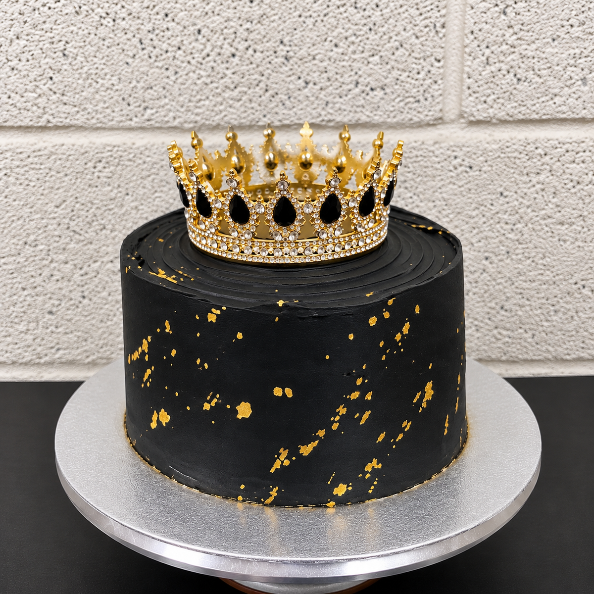 Crowned Black and Gold Cake