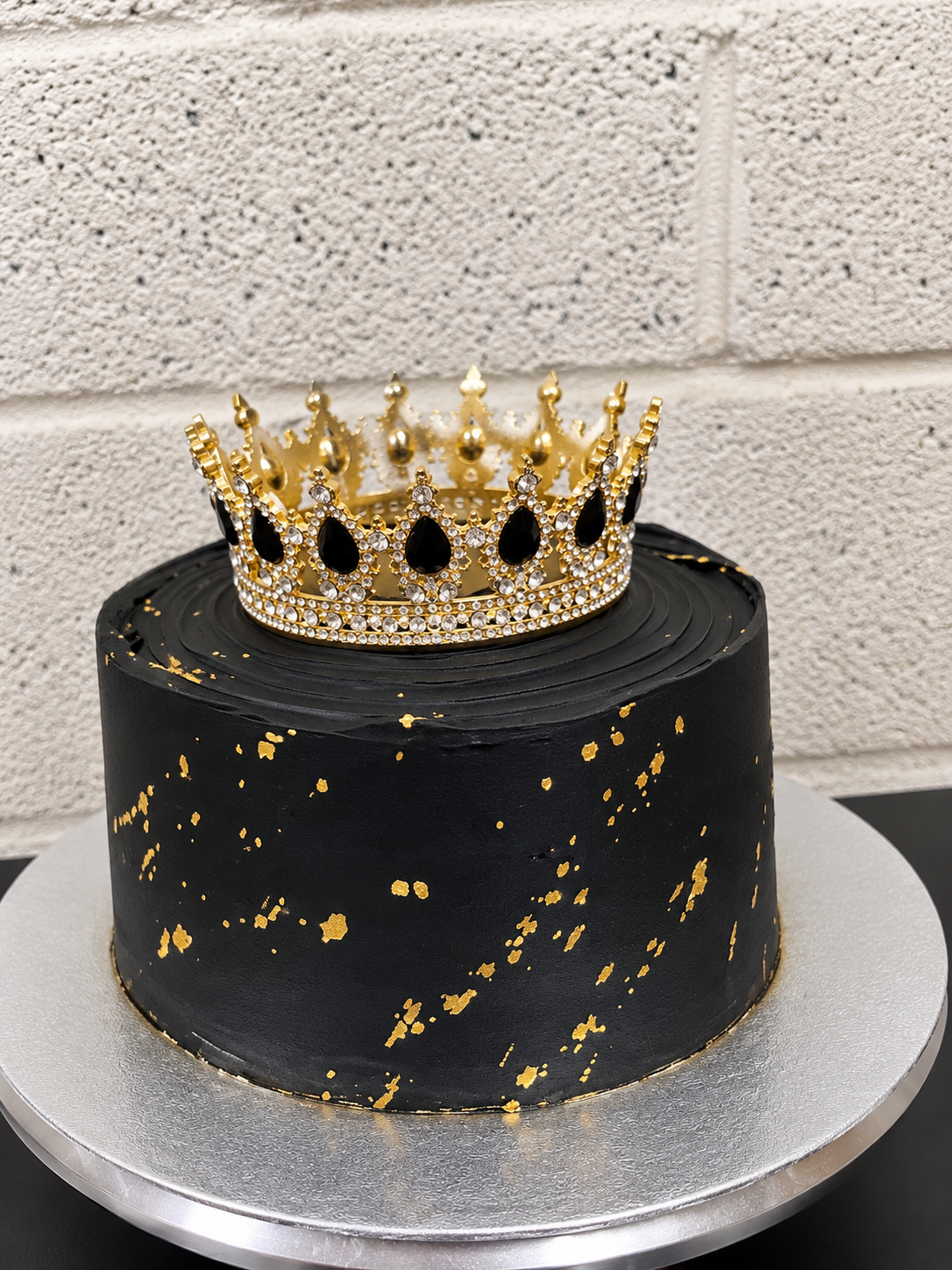 Crowned Black and Gold Cakes