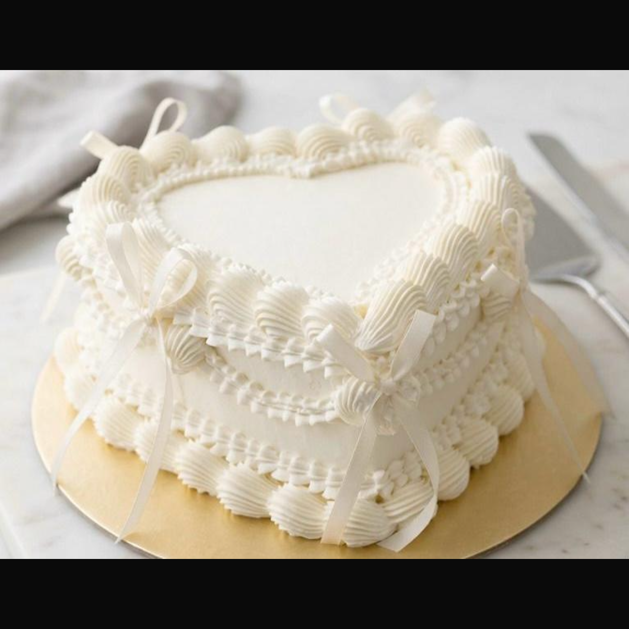 Vintage Style Heart Shaped White Cake